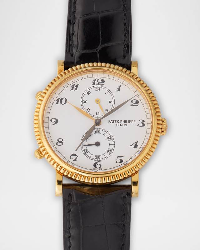 Patek Philippe Calatrava Travel Time 18K Yellow Gold 34mm Vintage Watch with Crocodile Strap